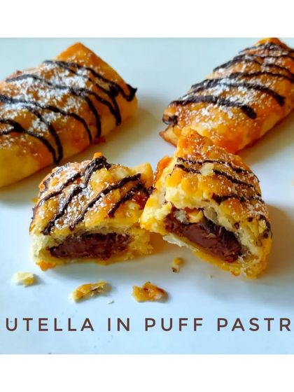 A simple yet irresistible treat. I take my flaky, all-butter puff pastry, fill it with Nutella, and bake it until golden. A drizzle of chocolate and a dusting of sugar finishes it off.