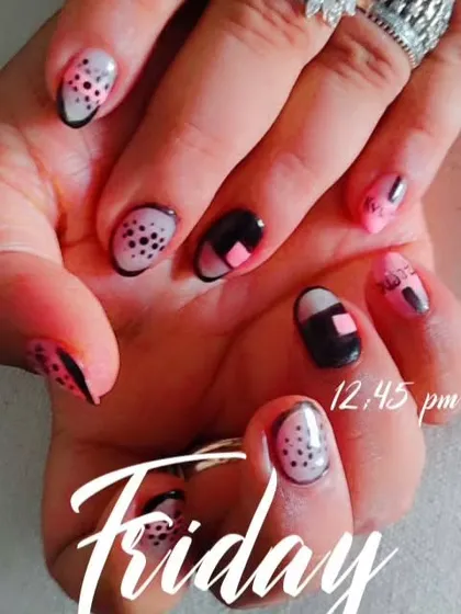 An edgy and graphic design with a mix of black, pink, and dotted patterns. This shows how we can play with different shapes and styles for a truly custom look.