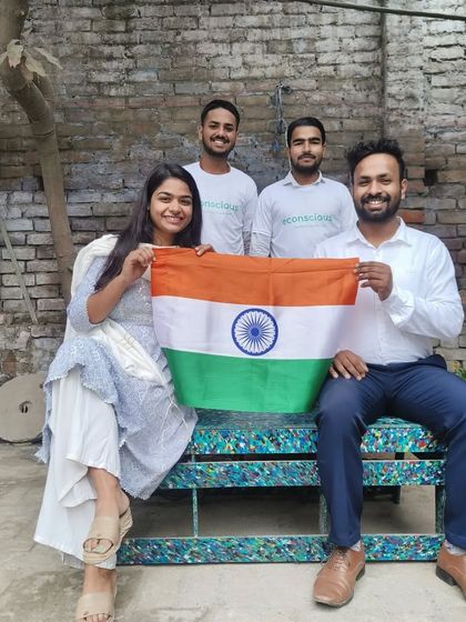 Celebrating Republic Day with our team, sitting on a bench made from the very plastic waste we are committed to cleaning from our environment.