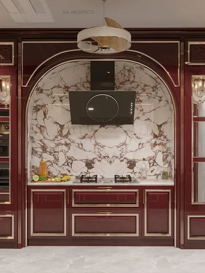 We transformed this culinary space into a masterpiece with a stunning maroon color palette. The classical design, featuring an arched cooking niche and book-matched marble, brings a timeless charm that is both functional and stylish.