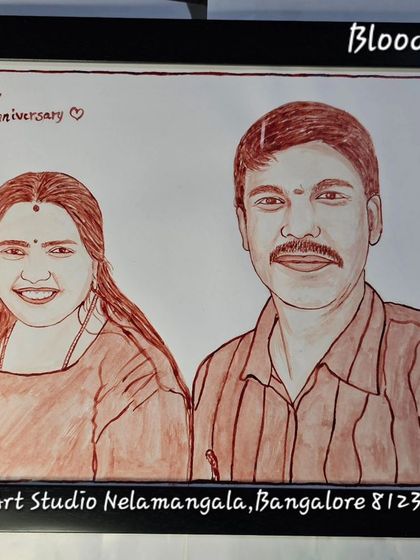 This custom blood painting was created to celebrate a 25th wedding anniversary. The handwritten note on the portrait adds a personal touch to commemorate this incredible milestone.