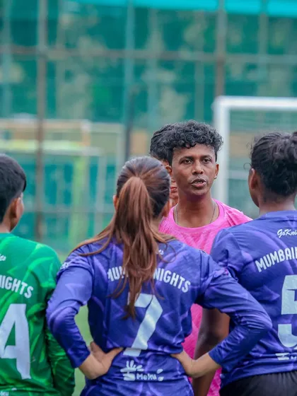 A mid-game huddle with the coach, discussing tactics and strategy. Communication and adaptability are key to our success.