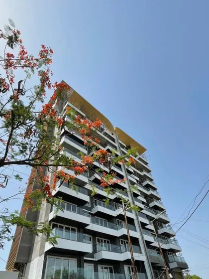 The facade of the 'Nanda Hi-Life' residential tower showcases our love for creating modern art through architecture. We used a rhythmic composition of glass and solid mass with brick textures to give this ultra-luxurious building its distinctive, plush look.