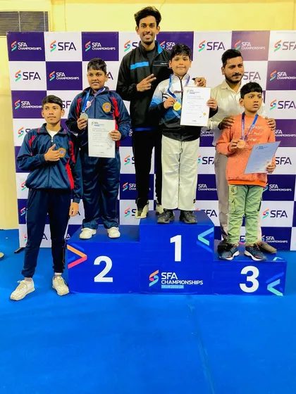 My students on the podium for the U-11 category at the SFA Championship. Yuvaan Kumar secured the gold medal with a powerful performance.