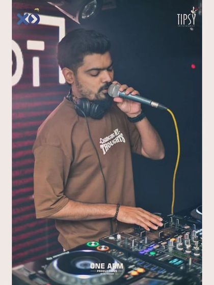 On the mic at Indigo XP, interacting with the crowd. I believe a DJ should be more than just a music player; I'm there to host the party.