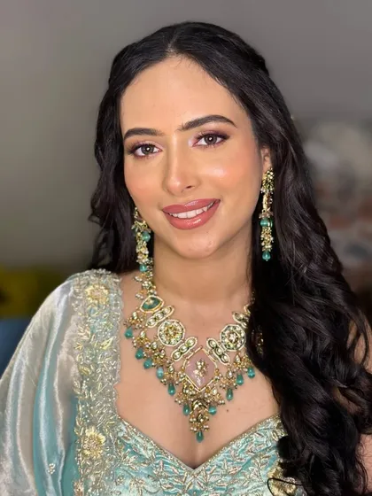 The final look for this morning Roka bride. Her makeup is fresh and luminous, with a half-up hairstyle that keeps it elegant and comfortable for the daytime event.