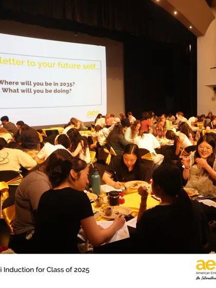As part of the Alumni Induction, seniors write letters to their future selves. This reflective exercise encourages them to think about their long-term goals as they join the alumni community.