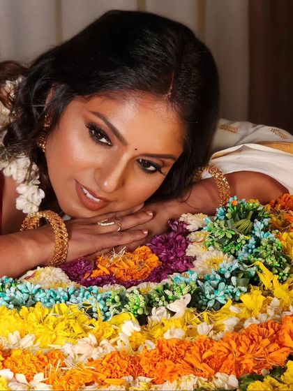 A close-up of the Onam look, with soft, natural makeup that enhances the festive glow.