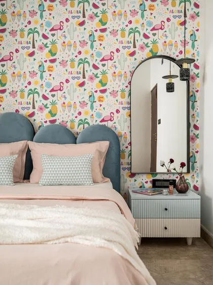 A glimpse into a vibrant kid's room where I used a playful flamingo wallpaper as the main feature. The design balances fun aesthetics with functional elements like a custom headboard and bespoke side tables, creating a space that is both cheerful and practical.