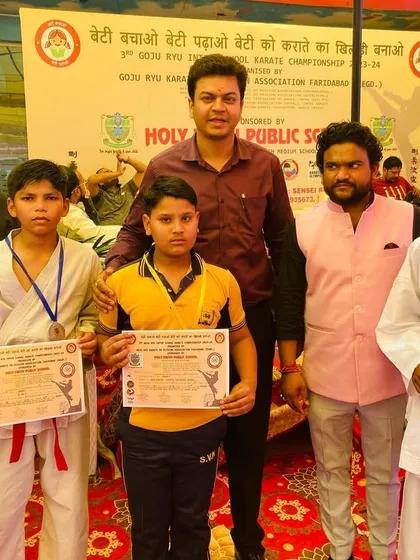 My student Dhanraj with his gold medal at the 3rd Inter-School Karate Championship. We celebrate every victory, big or small.