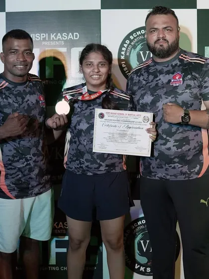 Me with our coach Heena and fighter Divya after the Navsari championship. Divya fought hard, and even with a controversial loss, she showed the heart of a champion.