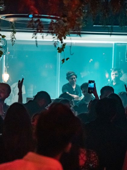The crowd at a club in Thane, with phones in the air, capturing the moment.