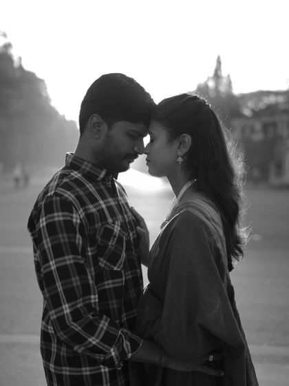 This black and white close-up captures the quiet intimacy and gentle connection between the couple, making for a powerful portrait.