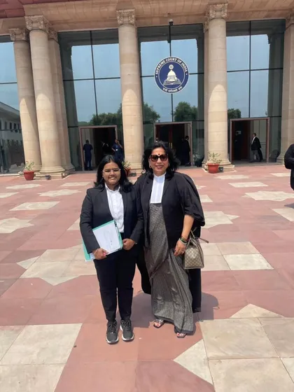 Outside the Supreme Court with a former law intern after a hearing for our PIL on strengthening Internal Complaints Committees (ICCs) under the PoSH Act. It is a long journey to ensure women are safe at their workplace, but every step in the highest court brings us closer to that goal.