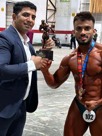 My athlete Dilip with his bronze medal at Mr. Universe. A great achievement on an international stage.