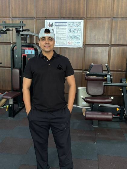 A relaxed pose in the gym.