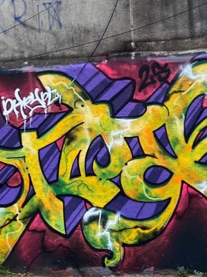 A closer look at the Devnagri piece from Jakarta. The yellow and purple pop, with the lightning effect giving it that extra energy. It's all about making the letters dance.