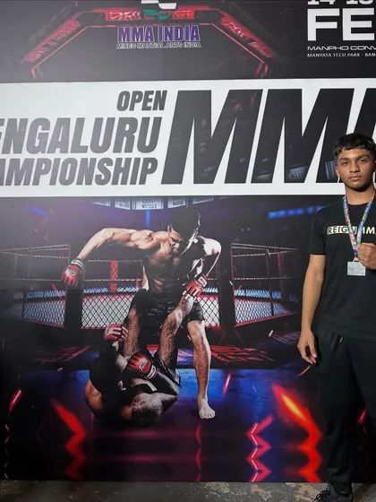 Almeer after securing a silver medal in his first under 18 tournament. Balancing final exams and a competition is tough, but this 15 year old is built differently.