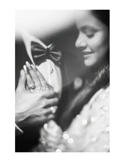 A classic, timeless moment captured in black and white. This image from an engagement session focuses on the gentle touch, the soft smile, and the deep emotion between the couple. It proves that sometimes, the simplest frames hold the most powerful stories.