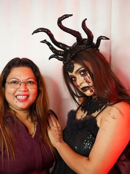 A dark fantasy or gothic-inspired look. This style uses bold, black lipstick and dramatic eye makeup to create a powerful and edgy character.