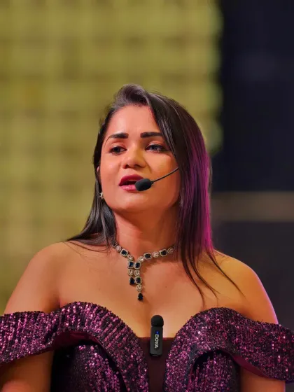 Focused and in the moment during a Diwali celebration. My job is to ensure the festive spirit is high and the event runs smoothly.