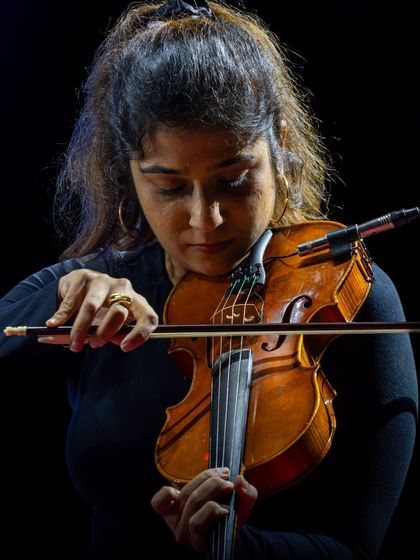 The incredible Apoorva Krishna lost in her violin solo at the Jazz Al Parque festival. Her performance was a beautiful highlight, showcasing the depth of talent in our band.