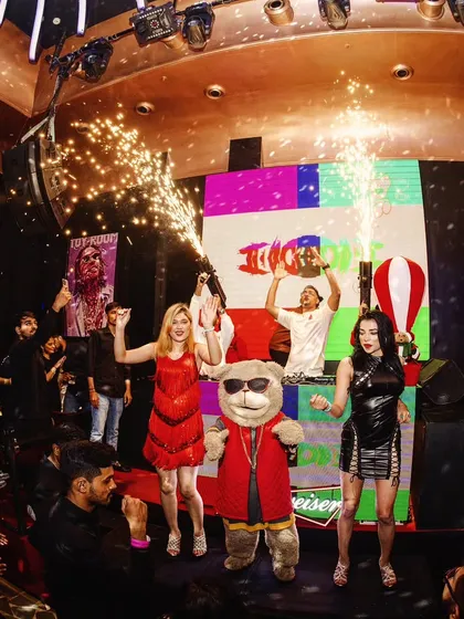 A full-stage view of the Christmas party at Toy Room, complete with dancers, the club mascot, and pyro. We create a complete show, not just a DJ set.