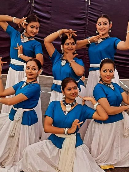 Our dancers in a graceful pose during the 'Dharithri' performance at Karavali Utsav.