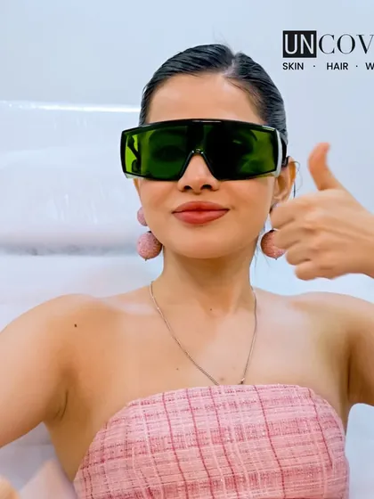 Uorfi gives a thumbs up after her laser hair removal session. Her approval is a testament to the comfortable and effective treatments we provide to all our clients.