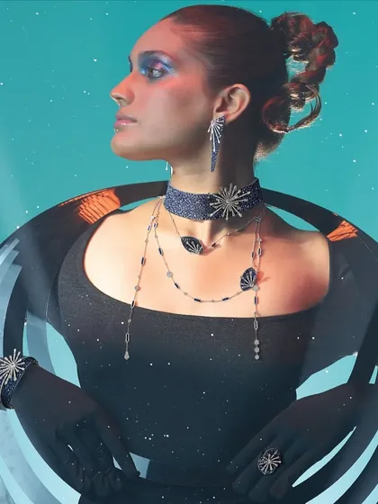 In this high-fashion editorial for Popley Eternal, the styling was conceptual and futuristic. I used a structured black gown and dramatic jewelry to create a celestial narrative, transforming the model into a cosmic entity.