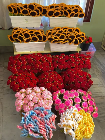 My favorite corner filled with finished flower heads in various colors and styles, from sunflowers to pink roses.