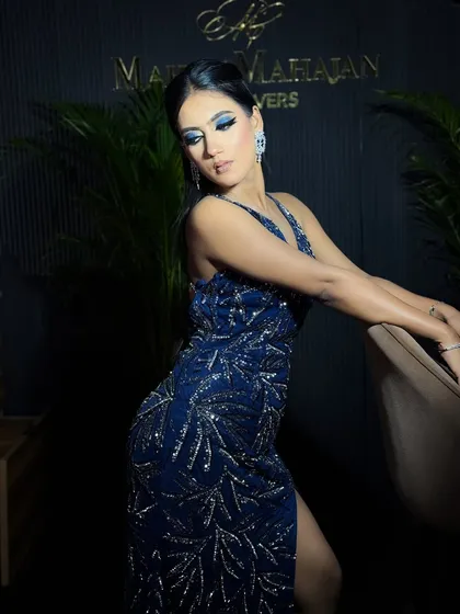 A side profile of the blue smokey eye, showing how it elongates the eye shape.