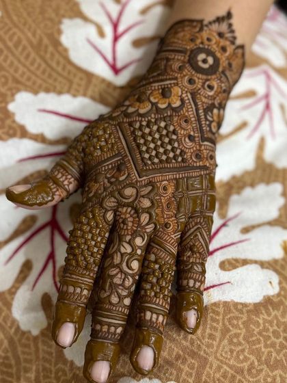 The full back-of-hand view, showing the intricate patterns.