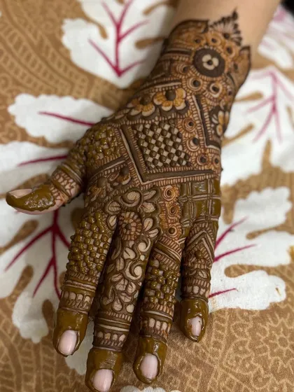 The full back-of-hand view, showing the intricate patterns.
