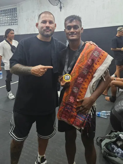 Our fighter with his coach and a gold medal after winning at Canggu Fight Night in Bali. We are proud to represent India on international platforms.