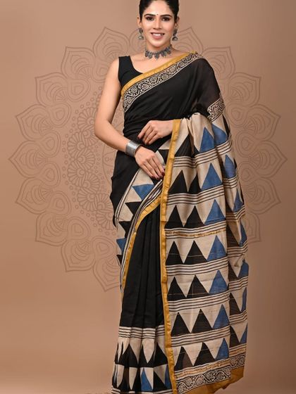 A black pure Chanderi cotton silk saree with a modern geometric triangle hand block print.