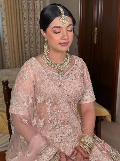 Eyes closed, you can see the seamless blend of the monotone eye and cheek color. This is a sophisticated take on soft glam.