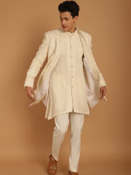 The flow and movement of this ivory Indo-Western jacket show how my outfits are designed for comfort, allowing you to celebrate without feeling restricted.