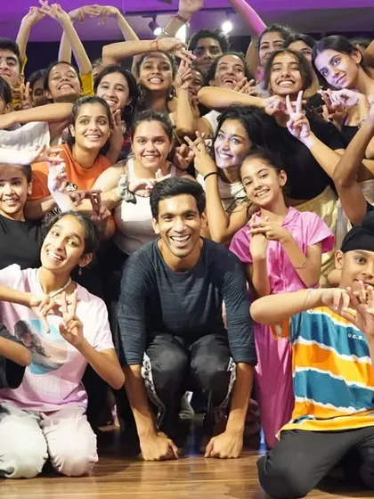 The group showing their love for the dance and the community.