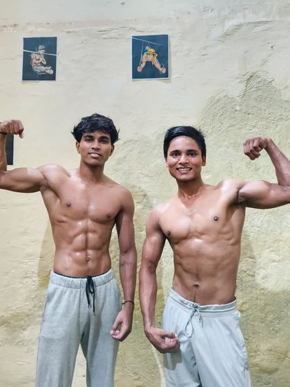 The results speak for themselves. Two of our athletes showing the lean, muscular physique built through bodyweight training.