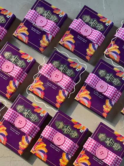 For a touch of purple, we included these crunchy chiki packs, wrapped with a gingham ribbon and a cute button detail.