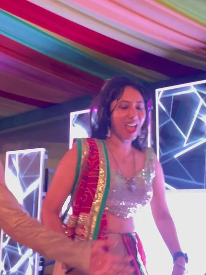 Caught in a candid moment, dancing with guests. My goal is to make everyone feel comfortable enough to let loose on the dance floor.
