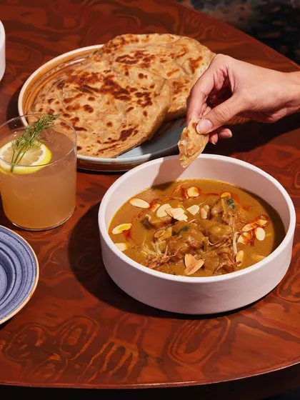 A classic pairing: a rich, creamy curry served with flaky Malabar parathas. Our breads are made fresh in-house and are the perfect vehicle for soaking up our delicious gravies.