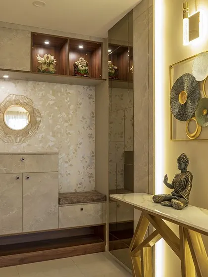 The entryway sets the tone for the entire home. We designed this foyer with a blend of earthy tones, a large mirror to enhance the sense of space, and a custom console with integrated storage, creating a welcoming and organized first impression.