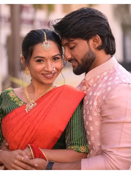 A romantic engagement portrait. Leenal and Romit look so in love, with her radiant makeup glowing in the beautiful light.