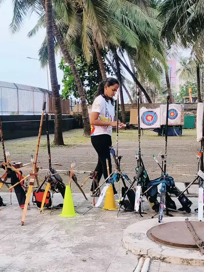 An archer getting ready for practice after the pooja. The blessings are for a year of focus and success.