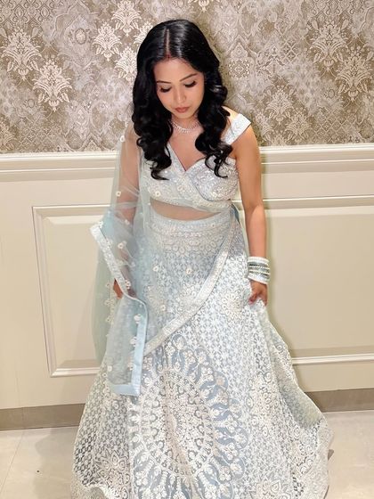 A candid moment, showing the flow of her outfit.