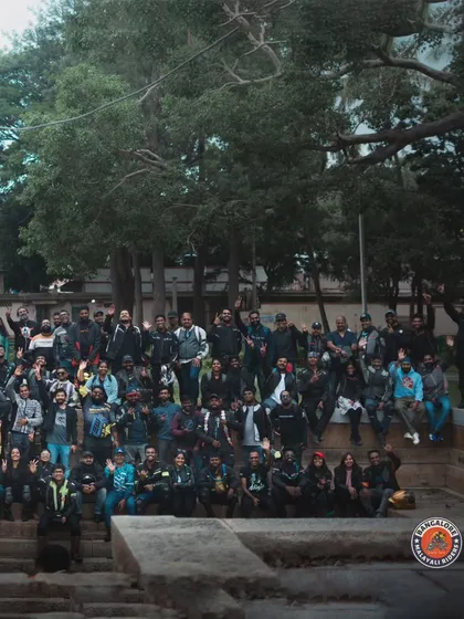 The whole gang waving for a group photo at Bhoga Nandishwara Gudi. This is what a successful community ride looks like.