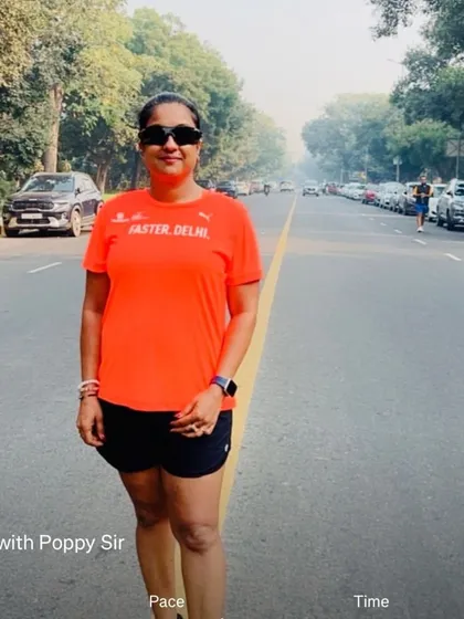 A member from the "Faster Delhi" group running with us. We love collaborating with other running communities in the city.