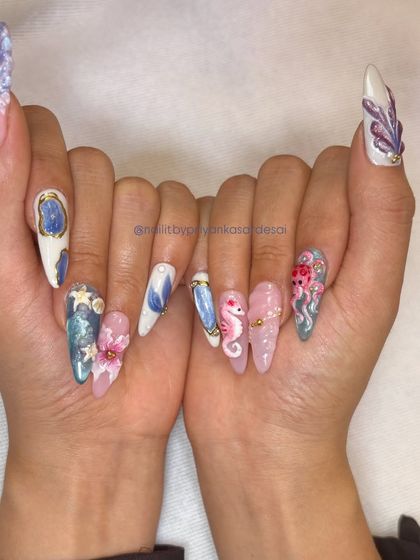 A final look at the full 3D ocean set, showcasing all ten nails as a complete, wearable art piece that's perfect for a beach vacation.